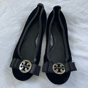 Black velvet Tory Burch flats with bow detail